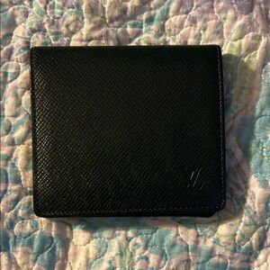 Louis Vuitton Forest Green bi fold wallet w/coin pocket.